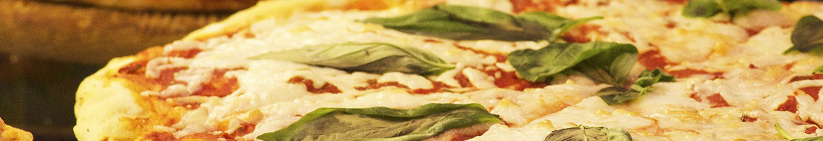 Eating Italian Pizza at Nostalgia Wood Fired Oven restaurant in Washington, MI.